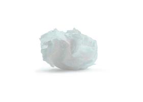 Single screwed or crumpled tissue paper or napkin after use isolated on white background with clipping path photo