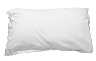 White pillow with case after guest's use at hotel or resort room isolated on white background with clipping path, Concept of confortable and happy sleep in daily life photo