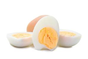 Close up of boiled chicken egg with peeled halves isolated on white background with clipping path, Selective focus photo