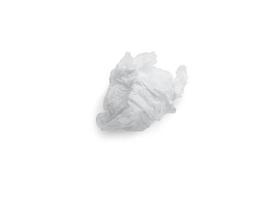Single screwed or crumpled tissue paper after use isolated on white background with clipping path photo