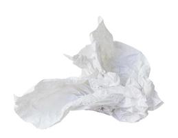 Single screwed or crumpled tissue paper or napkin in strange shape after use in toilet or restroom isolated on white background with clipping path photo