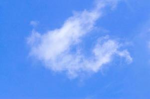 Beautiful blue sky with white cloud and clear light under shining from the sun photo