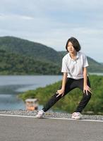 Woman short hair doing exercising outdoor photo