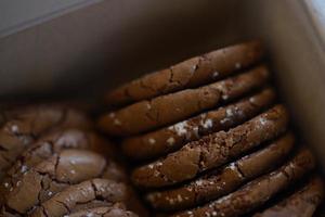 Chocolate cookies, many thin brownie chocolate cookies with salt. photo