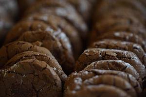 Chocolate cookies, many thin brownie chocolate cookies with salt. photo