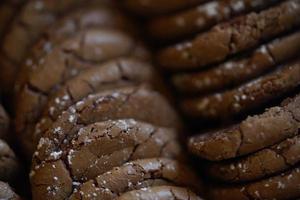 Chocolate cookies, many thin brownie chocolate cookies with salt. photo