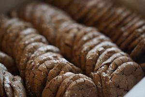 Chocolate cookies, many thin brownie chocolate cookies with salt. photo