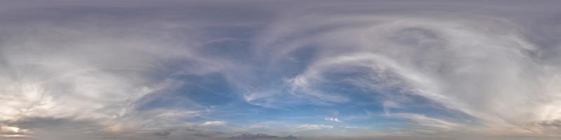 blue sky with evening clouds as seamless hdri 360 panorama with zenith in spherical equirectangular projection may use for sky dome replacement in 3d graphics or game development and edit drone shot photo