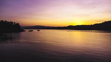 Aerial view of landscape sunset with Reservoir and raft house Thailand photo