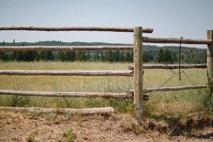 fence and a field photo