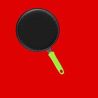 Frying pan isolated on a background photo