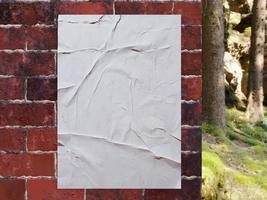 Blank poster glued on brick wall at far side near forest for mock up, 3d render photo