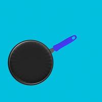 Frying pan isolated on a background photo