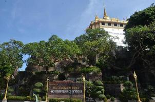 Landmark, The golden mount temple translate language. Important tourist attractions in Thailand are popular with foreigners. photo