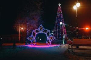 Christmas tree at night in the city photo