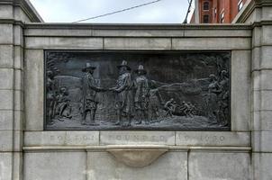 The Founders Memorial, also known as Founding of Boston, is a 1930 sculpture installed in Boston Common, in Boston, Massachusetts, 2022 photo