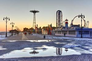 Coney Island Boardwalk with Parachute Jump in the background in Coney Island, NY, 2022 photo