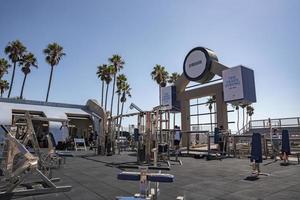 Weightlifting exercise equipment in open gym at Muscle beach on sunny day photo