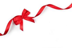 Red ribbon with Bow isolated white on background. Flat lay of ribbon red. photo