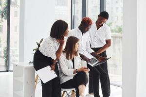 Group of african american business people working in office together photo