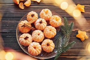 Many of the oranges. Christmas background with holiday decoration photo