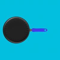 Frying pan isolated on a background photo