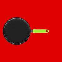 Frying pan isolated on a background photo