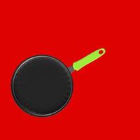 Frying pan isolated on a background photo