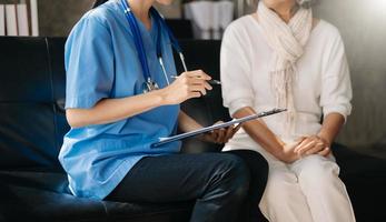 Kind nurse together with elderly woman in the hospital's photo