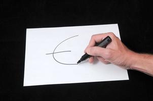 Drawing on a White Paper photo