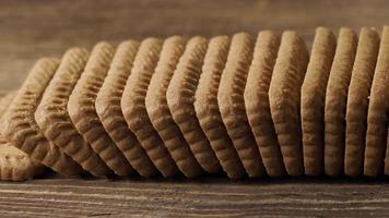 Tasty cookies biscuits on wooden background