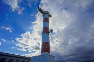 Lighthouse by the sea photo