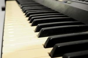 Piano keyboard closeup photo