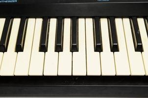 Piano keyboard closeup photo