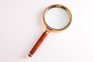 Isolated glass magnifier photo