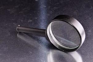 Isolated glass magnifier photo