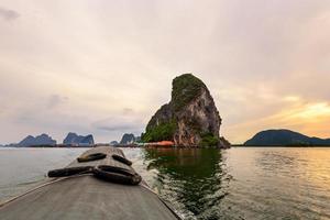 Tour Panyee island in the sunset photo