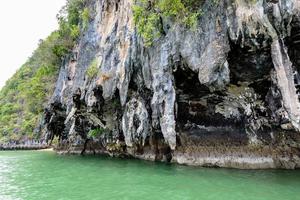 Exotic stone caves of the island photo
