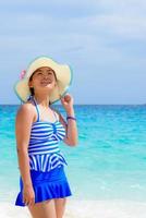 Girl on the beach at Thailand photo