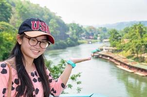 Tourist on Death Railway bridge viewpoint photo