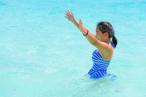 Happy girl in the sea photo