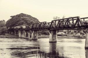 Black and white bridge over the River Kwai photo