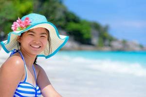 Happy girl on the beach at Thailand photo