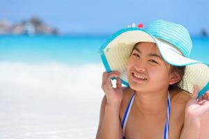 Happy girl on the beach at Thailand photo