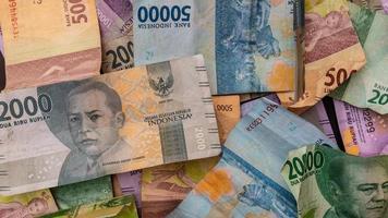 stack of rupiah banknotes as background photo