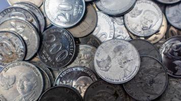 pile of rupiah coins as background photo