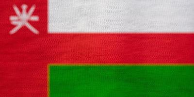 textura de la bandera de Omán como fondo foto