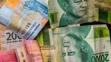 stack of rupiah banknotes as background photo