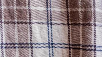 brown cloth texture with gingham as a background photo
