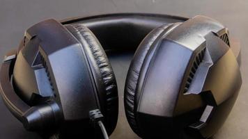 black headset isolated black background photo